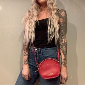 Round coach cross body